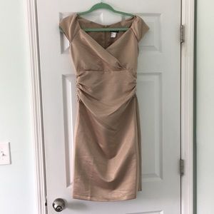 Golden dress perfect for a formal event or cocktail dress